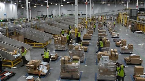 Robots are in full swing, and people are hard at work at the new Amazon sortation center in Liberty. . Amazon sortation center